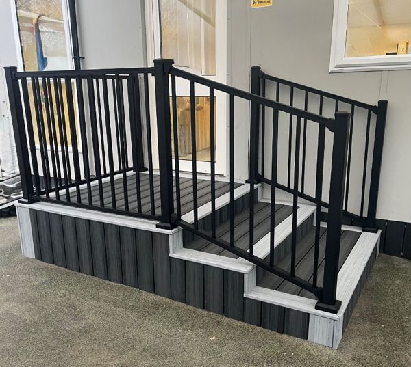 Trex Enhance Calm Water steps with Enhance Foggy Wharf border and Trex Signature Black railings