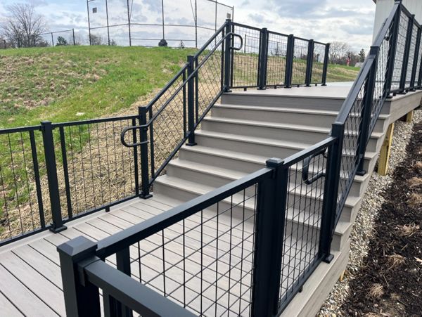 Trex Transcend Lineage Biscayne w/ Trex Signature Mesh railing in black.