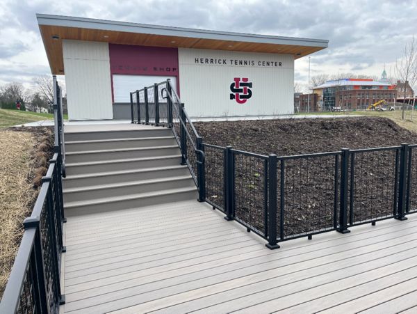 Trex Transcend Lineage Biscayne w/ Trex Signature Mesh railing in black.