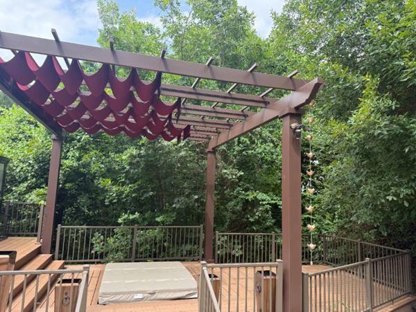 Hatteras Deck with Trex pergola and inset hot tub