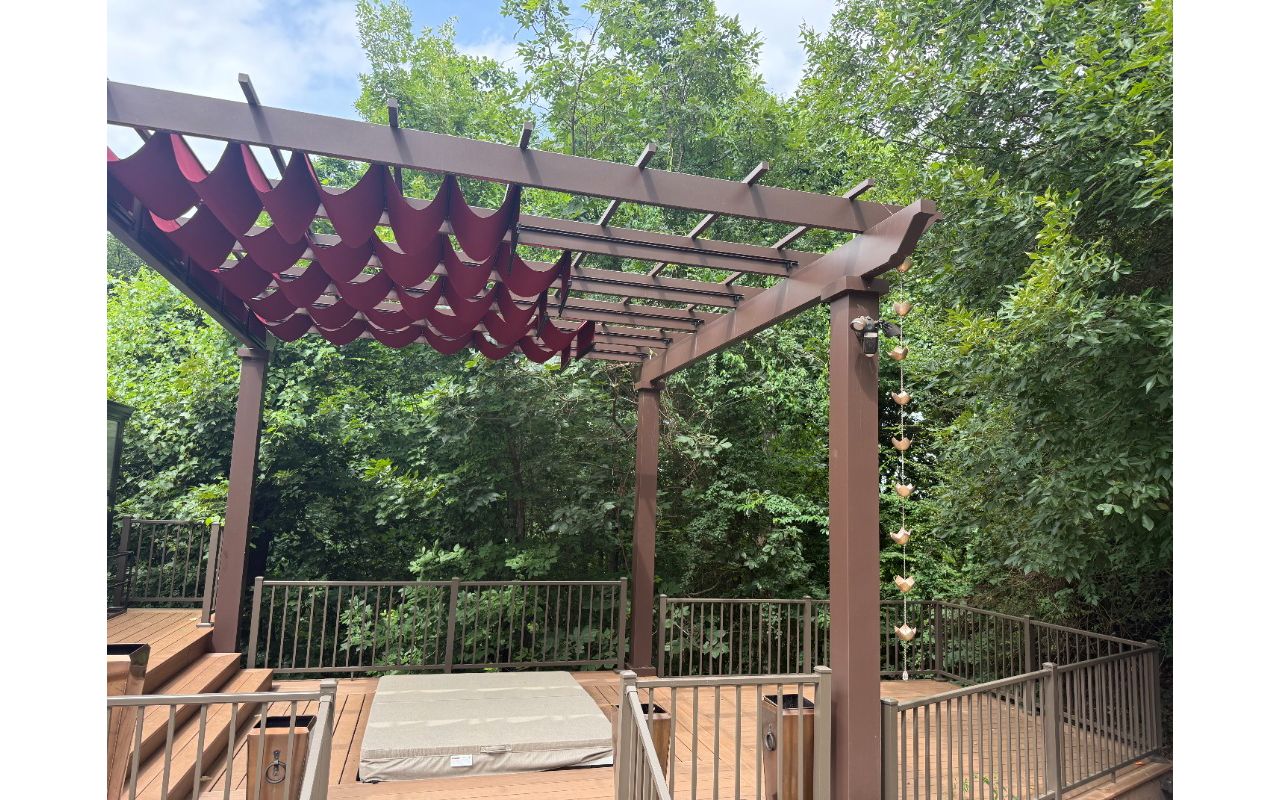 Hatteras Deck with Trex pergola and inset hot tub