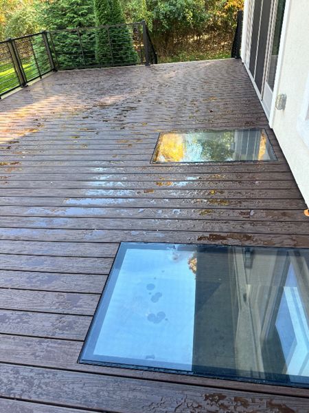 Trex Transcend Decking with Signature Rod Railing and SkyFloor lites.