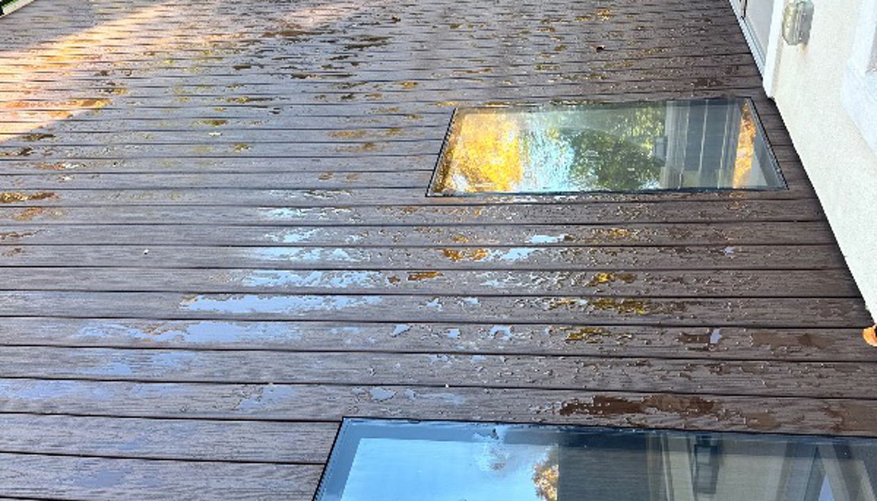 Trex Transcend Decking with Signature Rod Railing and SkyFloor lites.