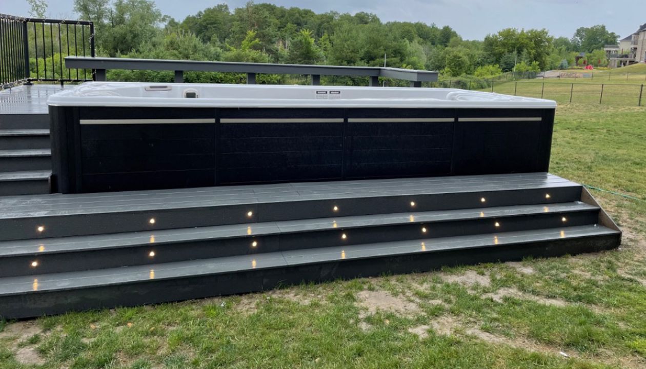 Newman Decks Trex composite, Swim Spa with Steps and Aluminum Picket Railings