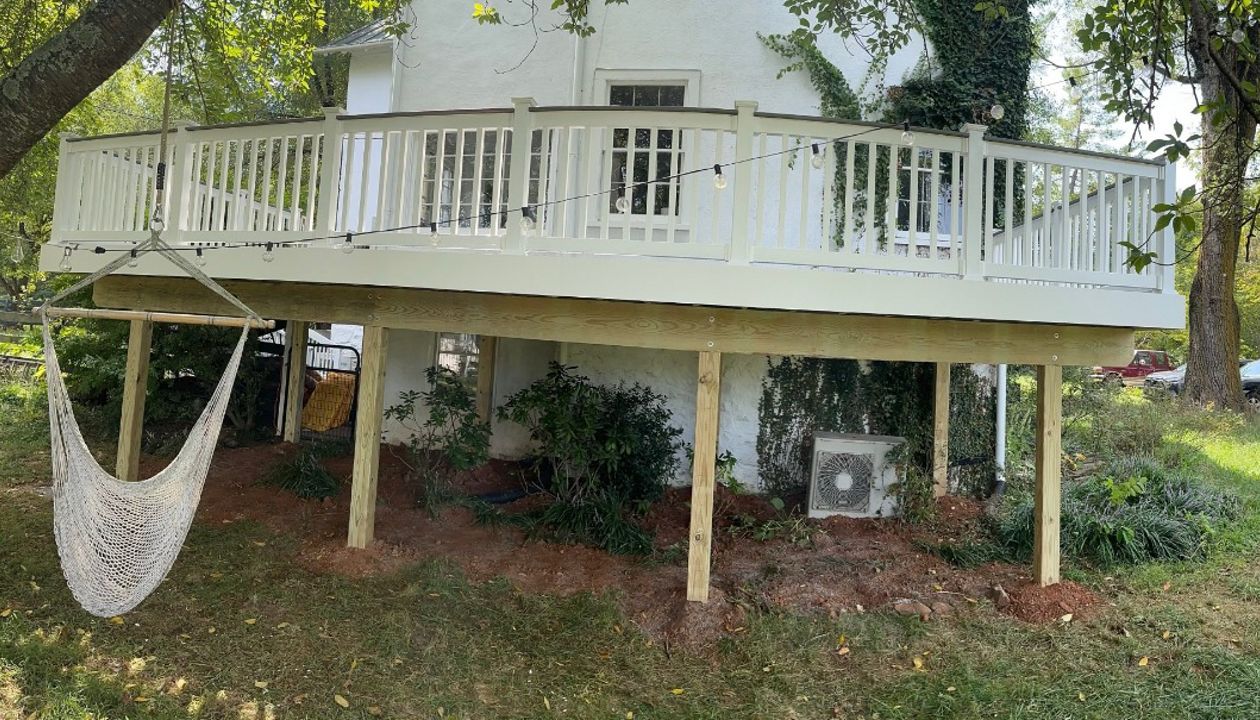 Transcend classic white railing. Post-to-post cocktail railing installation.