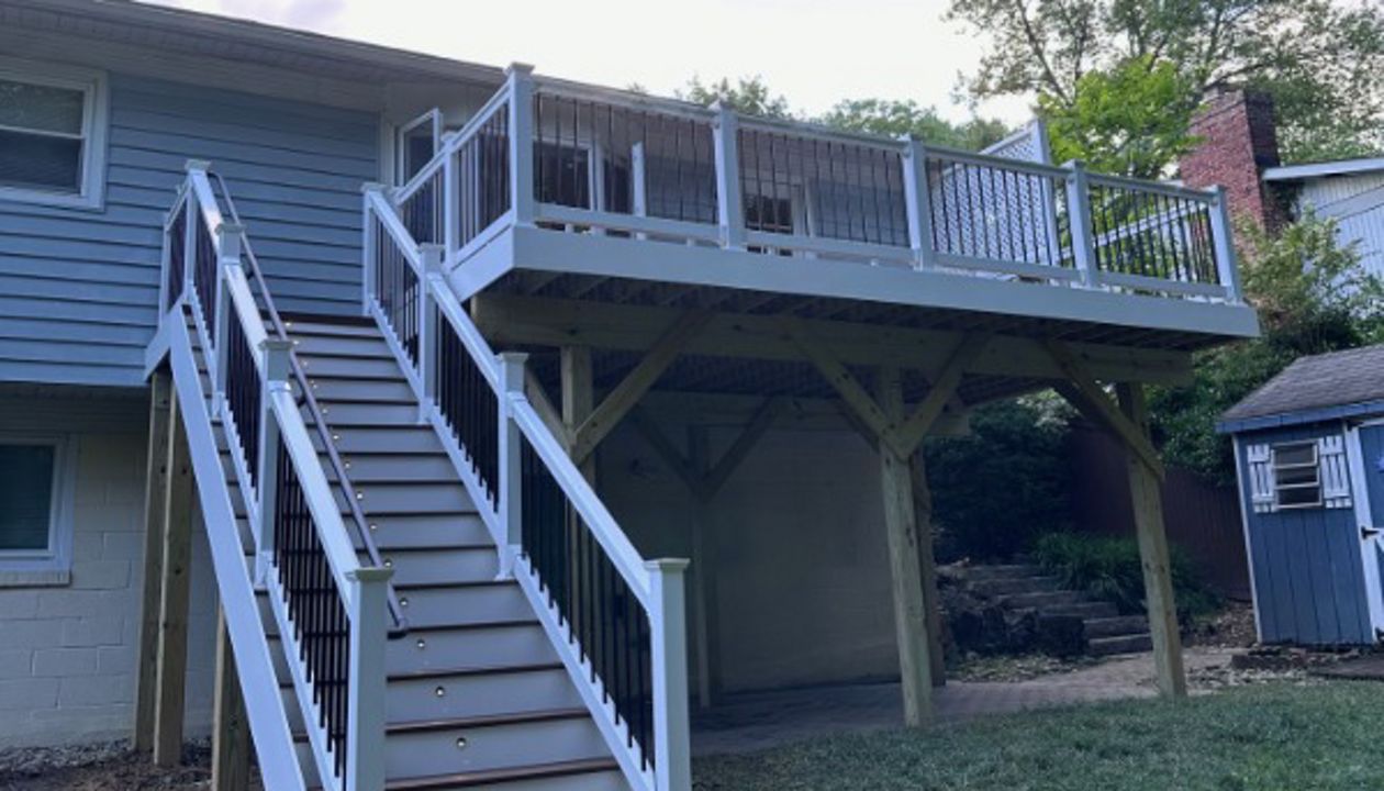 TREX Transcend classic white railing. TREX Enhance Beach Dune decking and step treads