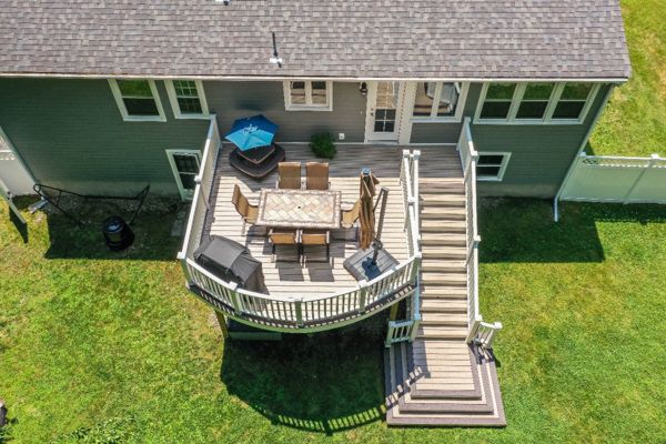 Professional Building Services Andover, MA Curved Decking & Cascading Staircase in Trex Transcend Spiced Rum