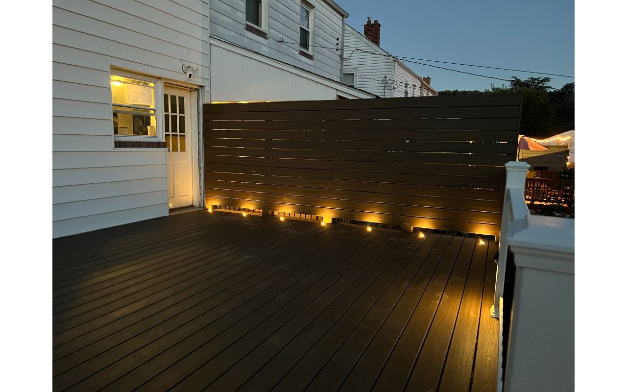 Custom Privacy Wall With Toasted Sand Decking