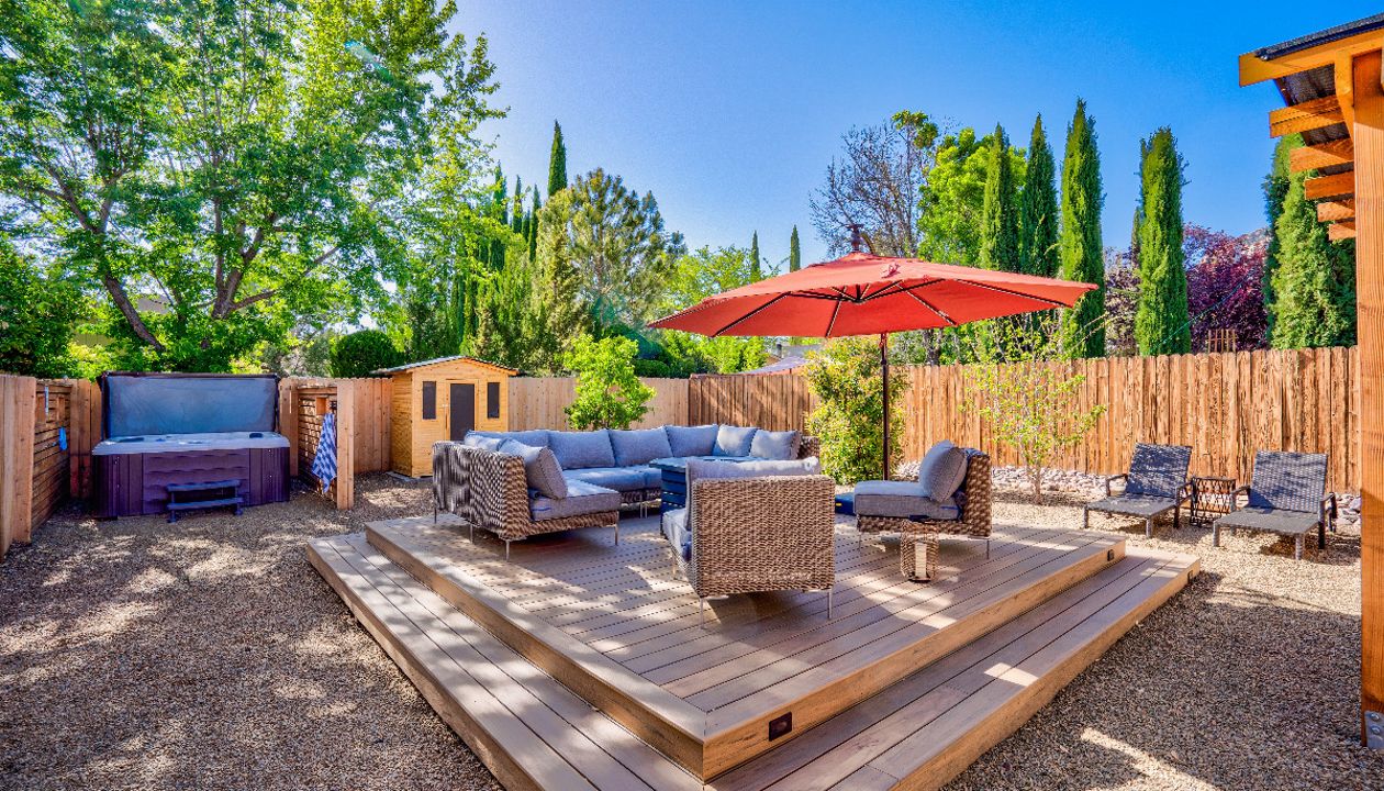 Sedona: Tiered backyard deck with step lighting