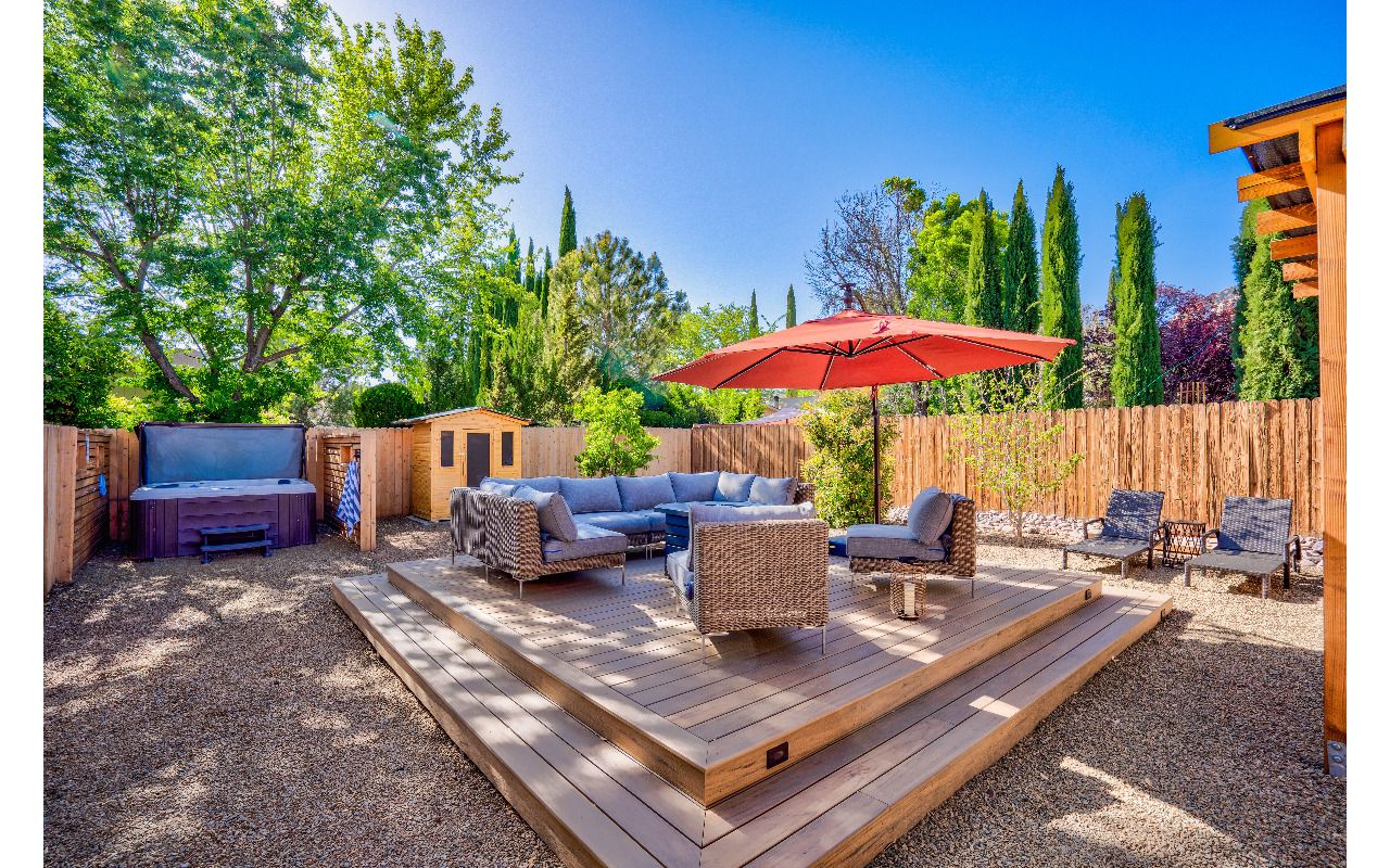 Sedona: Tiered backyard deck with step lighting