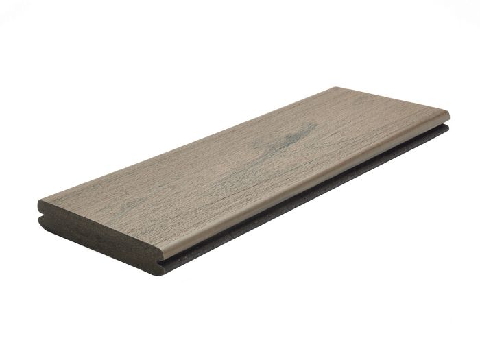 A single composite decking board with a wood-like texture and neutral gray tones. The board is displayed against a plain white background, highlighting its smooth edges and durable design. Ideal for outdoor flooring projects, it combines aesthetics with functionality.
