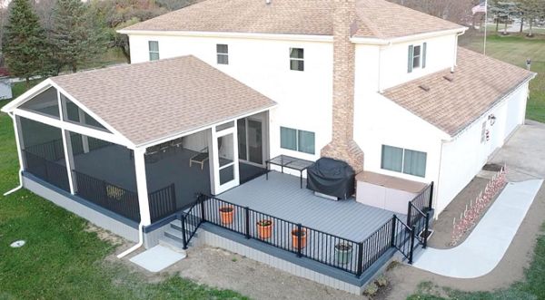 Modern covered patio with black accents, blending functionality with style.