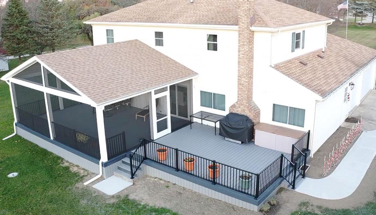 Modern covered patio with black accents, blending functionality with style.