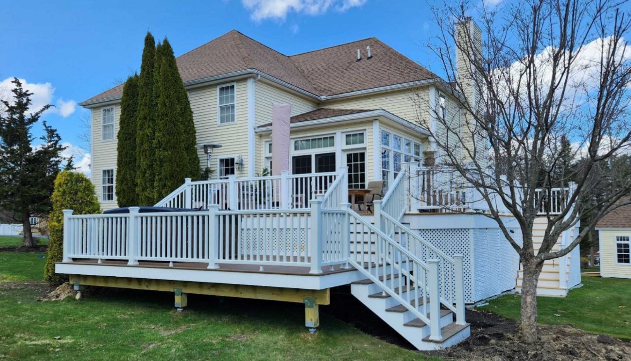 Merrimac, MA Professional Building Services Dual Staircase, Jacuzzi Support Deck in Select Saddle with Select White Railing