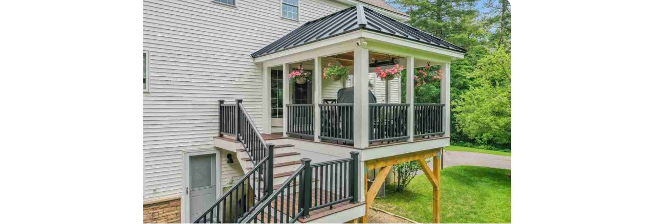 Salem, NH Professional Building Services Covered Porch in Transcend Spiced Rum Decking with Transcend Black Square Railing