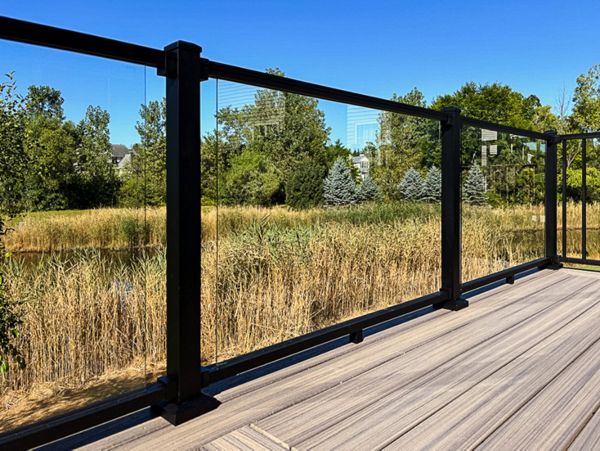 Trex Signature with Glass Railing & Enhance Naturals Rocky Harbor Decking
