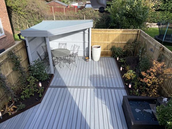 Trex composite decking installer near me in Amersham. Foggy wharf with Calm Water