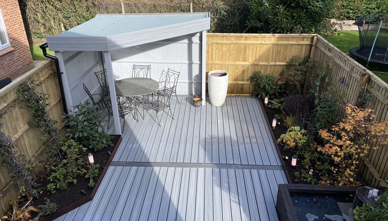 Trex composite decking installer near me in Amersham. Foggy wharf with Calm Water