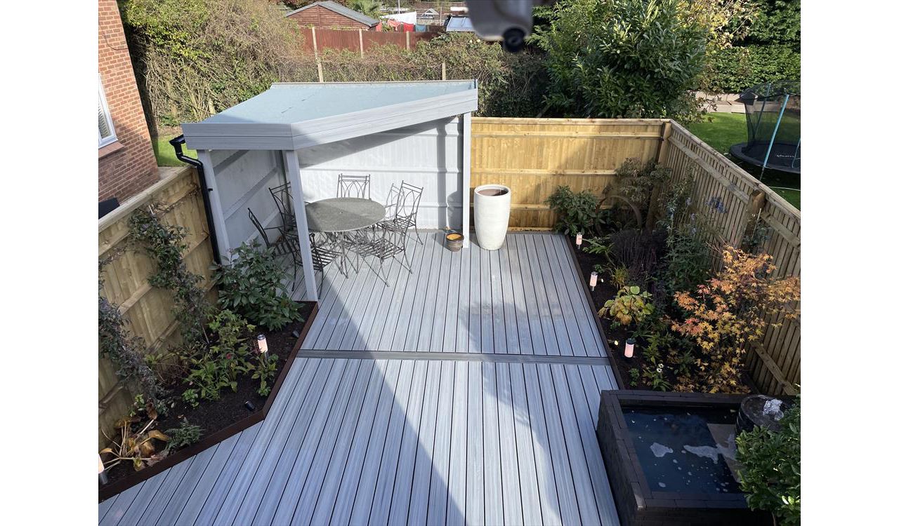 Trex composite decking installer near me in Amersham. Foggy wharf with Calm Water