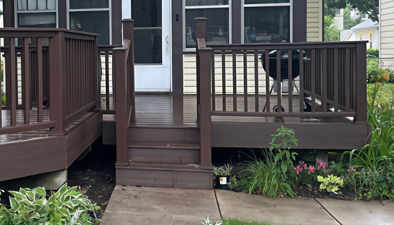 Trex Lava Rock decking with Trex Vintage Lantern Composite Railings with Drink Rail