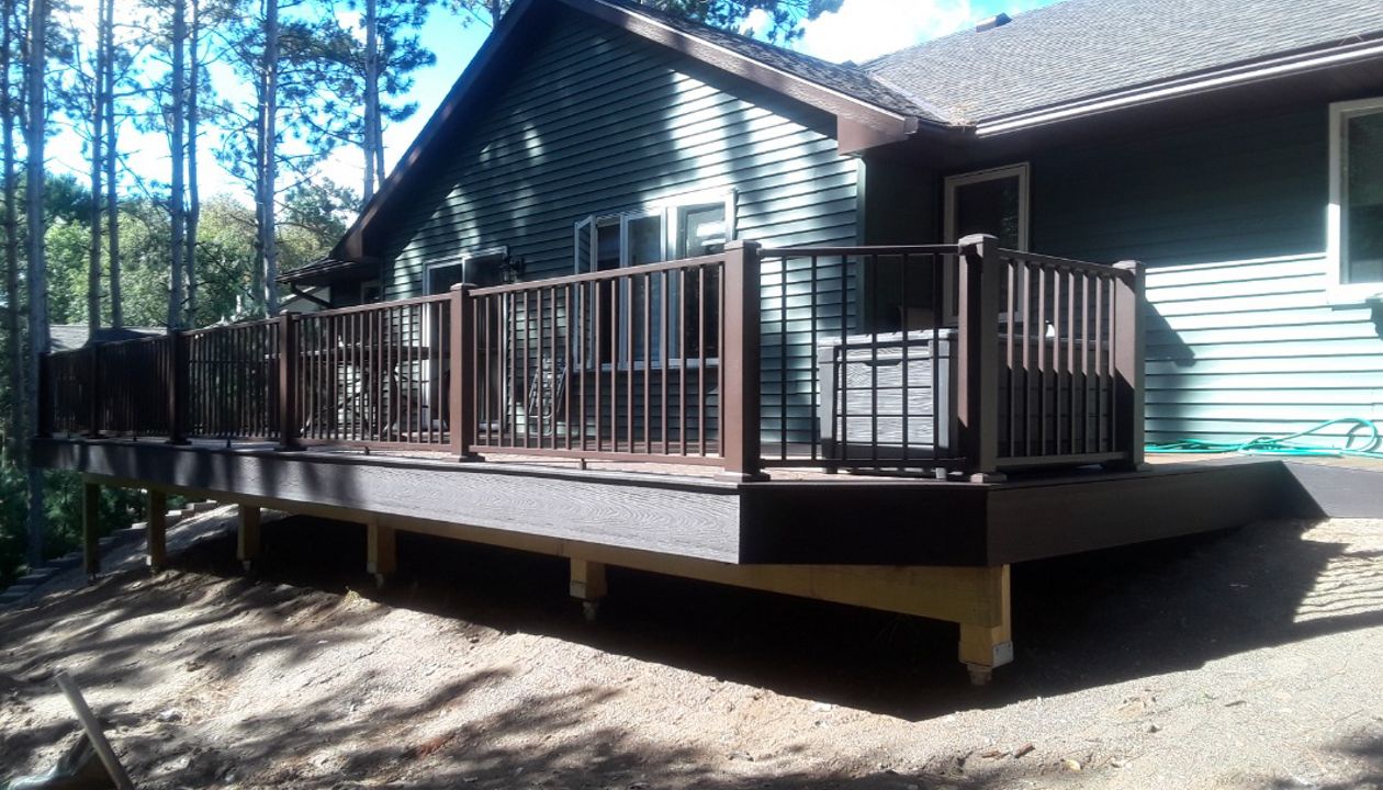 Low-maintenance composite Trex Select decking and Bronze Alum Railing