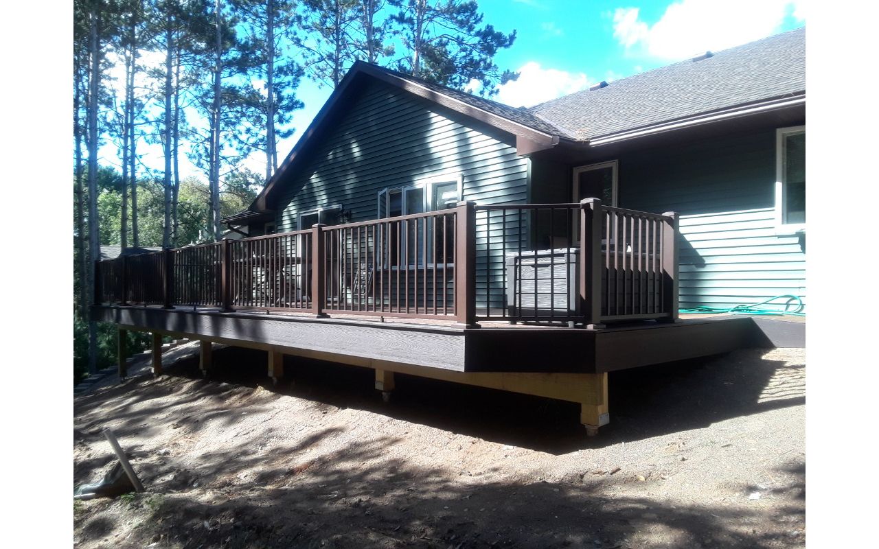 Low-maintenance composite Trex Select decking and Bronze Alum Railing