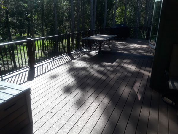 Trex Select Composite Decking in Saddle & Woodland Brown and Bronze Aluminum Railing for a Low-Maintenance Deck