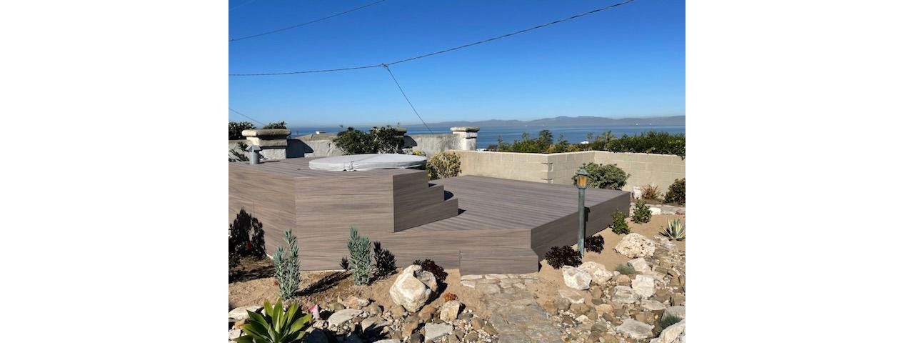 Trex Enhance hot tub deck in Rocky Harbor