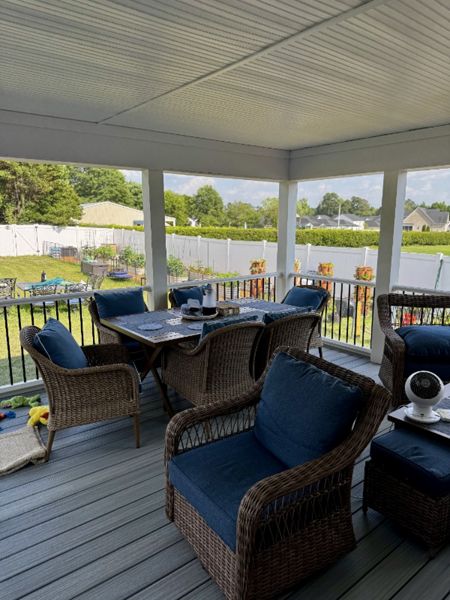 Trex Foggy Wharf composite deck installation with white railing and black spindles by local Lillington, NC contractor.