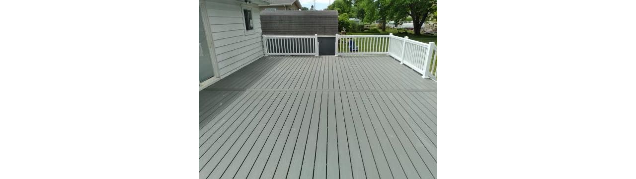 Clam Shell Decking with white railing.