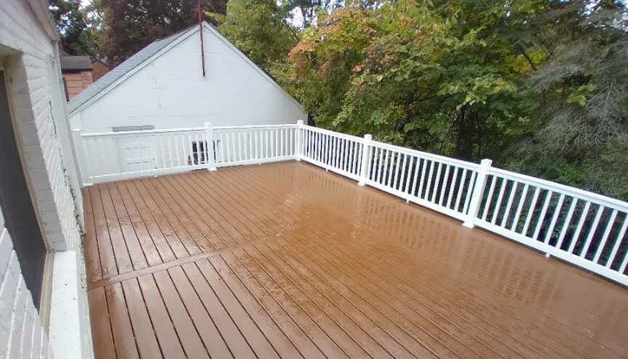 Saddle Decking with white railing.