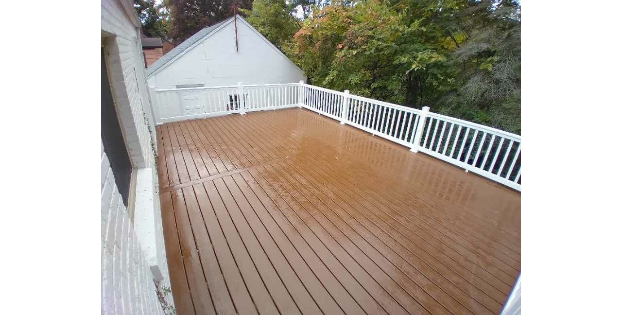 Saddle Decking with white railing.