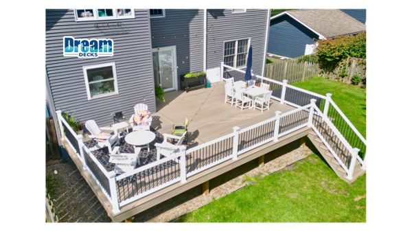Built for real life, not just looks.  Trex Honey Grove decking brings a warm, natural tone across the entire space, paired with white railing and black balusters for a clean, modern contrast. Designed with multiple zones so everything has its place.