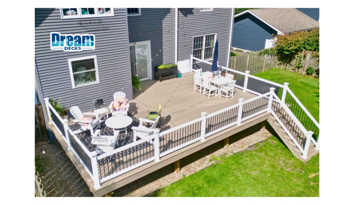 Built for real life, not just looks.  Trex Honey Grove decking brings a warm, natural tone across the entire space, paired with white railing and black balusters for a clean, modern contrast. Designed with multiple zones so everything has its place.