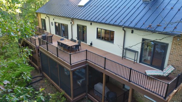 Tiki Torch with Signature Black 2 Story Deck, Steps and Screen Porch