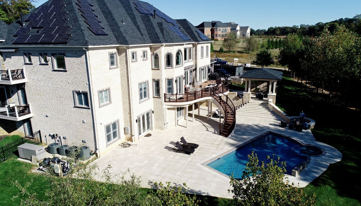 Curved deck and steps to linear patio and pool Clarksville, MD
