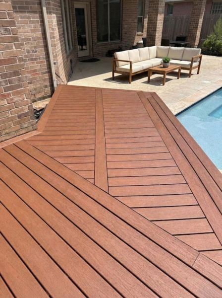 Custom diagonal composite deck design by the pool. Unique layout that enhances visual flow and creates a luxury outdoor experience.