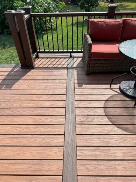Custom Trex composite deck installation in Houston, TX with clean center inlay detail. Designed for durability, low maintenance, and a modern outdoor living experience. Built by Iconic Upscale.
