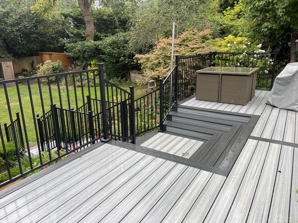 Foggy Wharf composite decking contrasting with Calm Water by Trex Enhance composite decking. Designed by Karl Harrison in Chorleywood