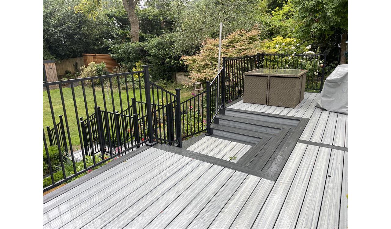 Foggy Wharf composite decking contrasting with Calm Water by Trex Enhance composite decking. Designed by Karl Harrison in Chorleywood