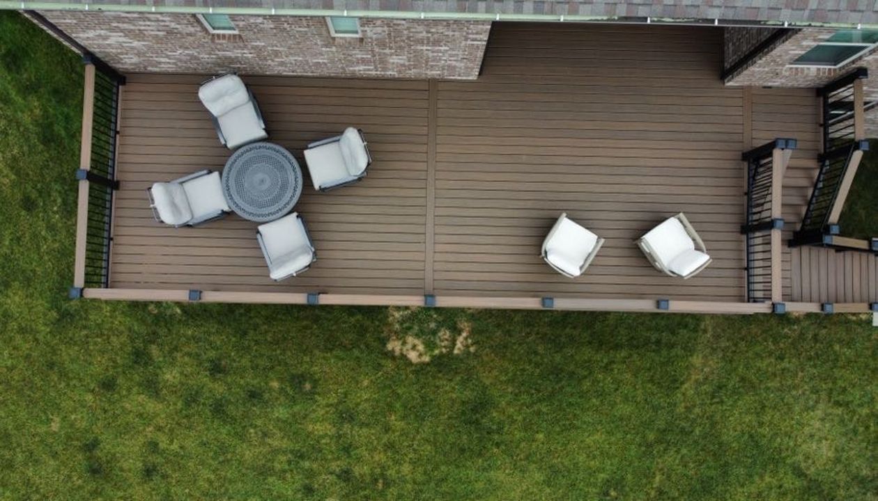 Enhanced Toasted Sand decking and Fascia with Charcoal Black Railing and Drink Rail-Overhead