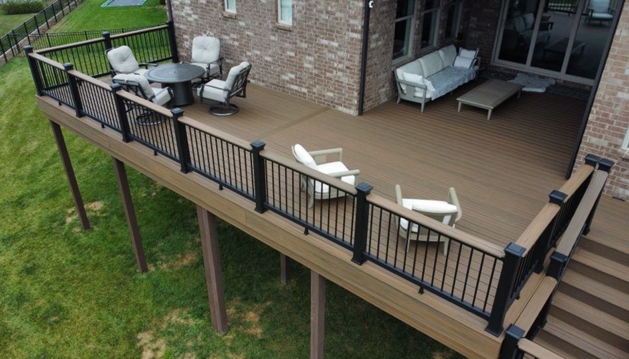 Enhanced Toasted Sand decking and Fascia with Charcoal Black Railing and Drink Rail