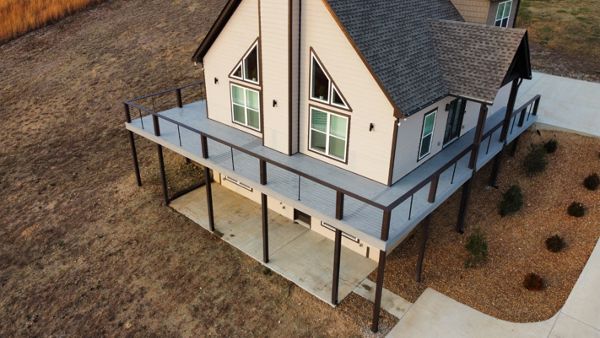 Trex Lineage in Rainier with custom cable railing