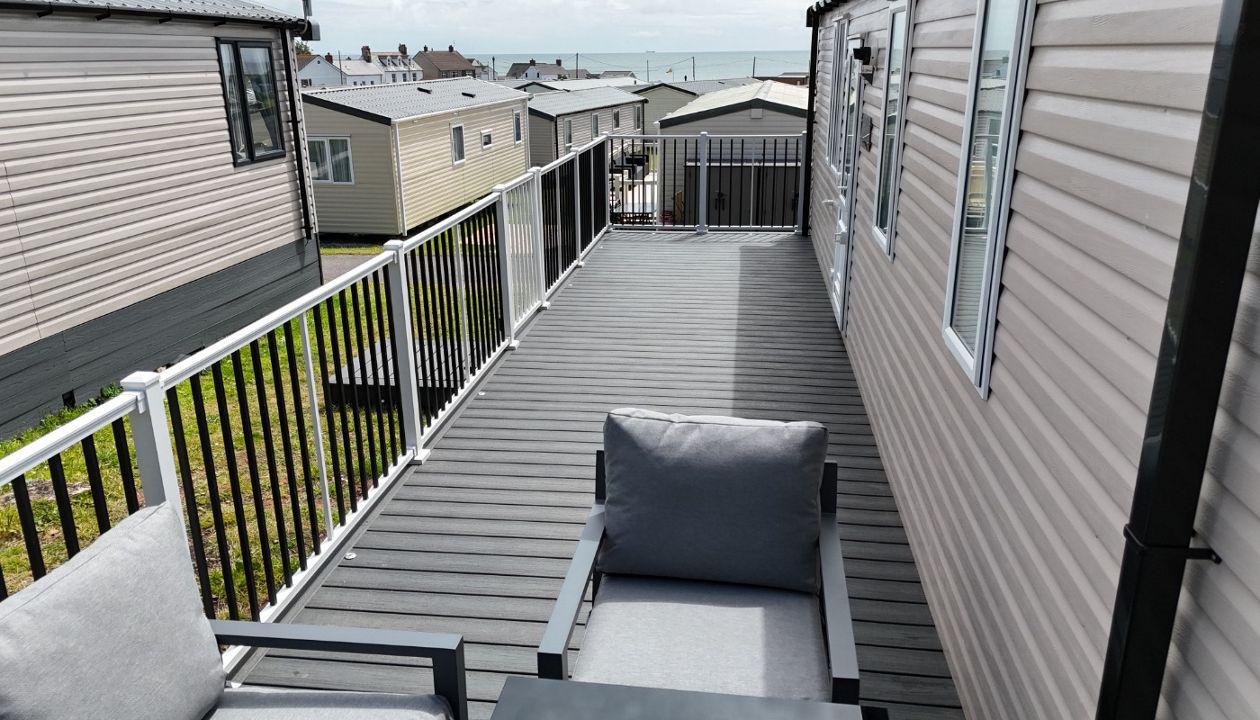 Calm Water deck with a special order signature rail in white with black spindles