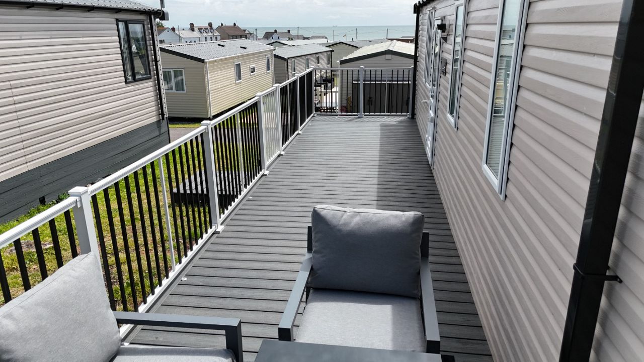 Calm Water deck with a special order signature rail in white with black spindles