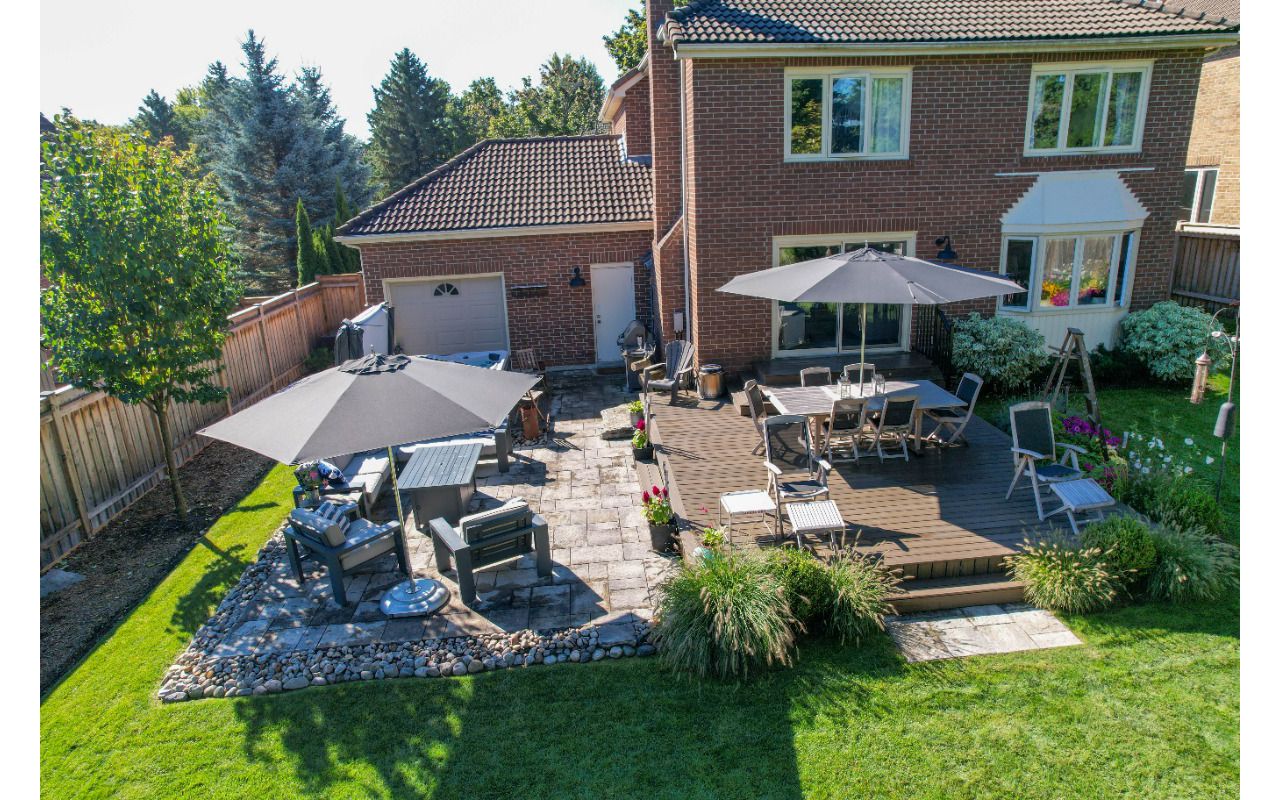 A Trex deck with a stone patio is our favourite combo!