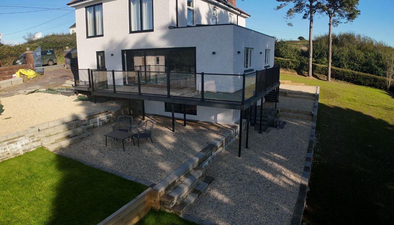 Signature rail with glass worked beautifully on this balcony deck