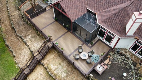 Trex Transcends Havana Gold Body, Lava Rock Border & Transends Railing & Trex LED Post Caps