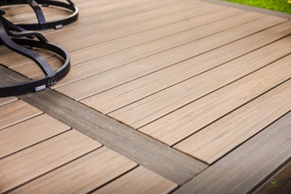 Close-up of Trex composite decking with a contrasting accent inlay board