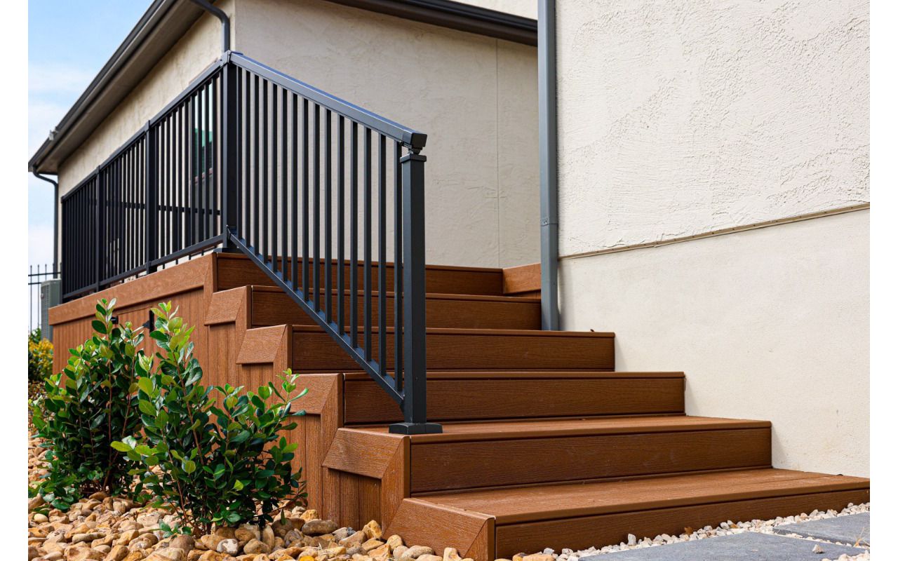 Trex composite stairs with black aluminum railing